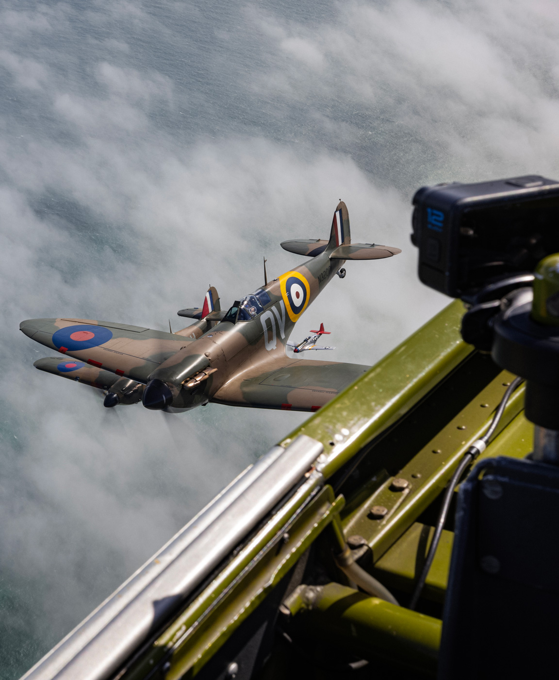 Historic warbirds flying in formation during the Big Wing experience